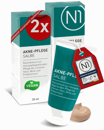 N1 Akne Pflege Salbe, 60ml Tube und Verpackung, geeignet für unreine Haut und Akne, mit antibakteriellen und beruhigenden Inhaltsstoffen, vegan und in Deutschland hergestellt.